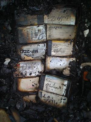 Pictured are client files and recordings destroyed by the fire at The Dutchman on January 9, 2009. The names of some of the recording groups are still visible -- El Mafioso, La. Vell, Wanz
